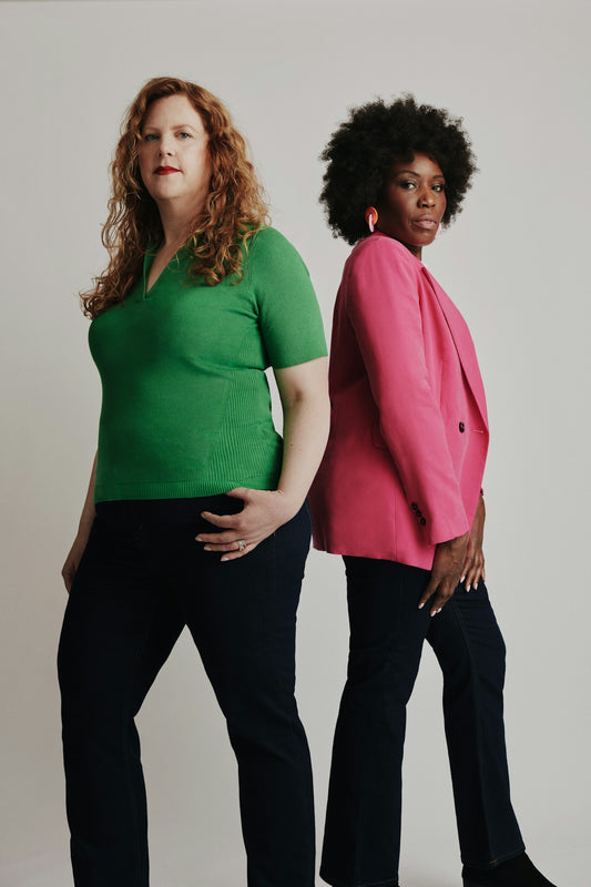 a couple of women standing next to each other