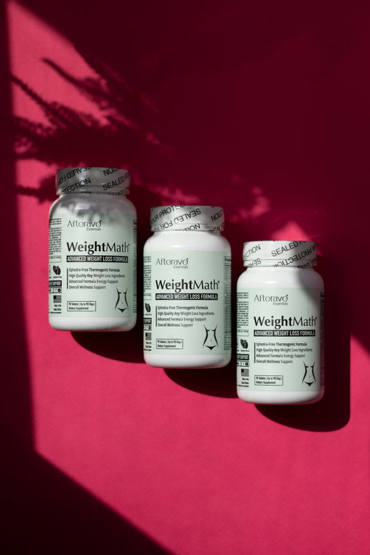 Three jars of weight loss pills on a pink background